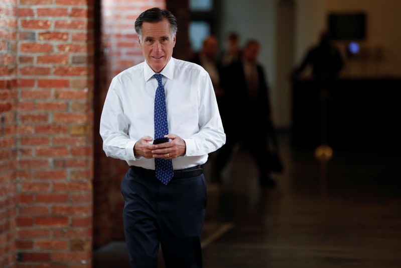 Sen. Mitt Romney (R-UT) walks to his office on the opening day of the 116th Congress on Capitol Hill in Washington