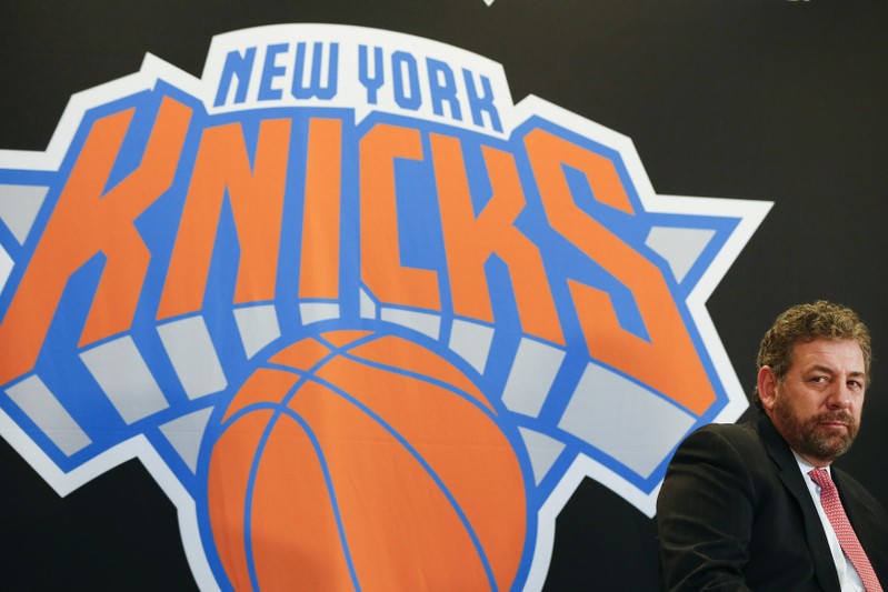 FILE PHOTO: New York Knicks owner Dolan looks on during a news conference announcing Phil Jackson as the team president of the New York Knicks basketball team at Madison Square Garden in New York