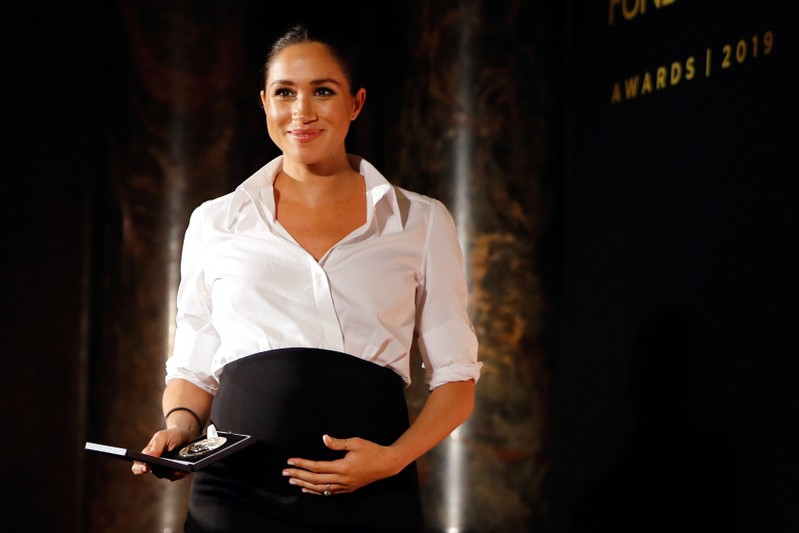 Britain's Prince Harry and Meghan, Duchess of Sussex, attend the Endeavour Fund Awards in the Drapers' Hall in London