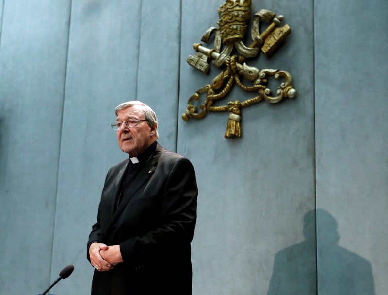 FILE PHOTO - Cardinal George Pell attends a news conference at the Vatican