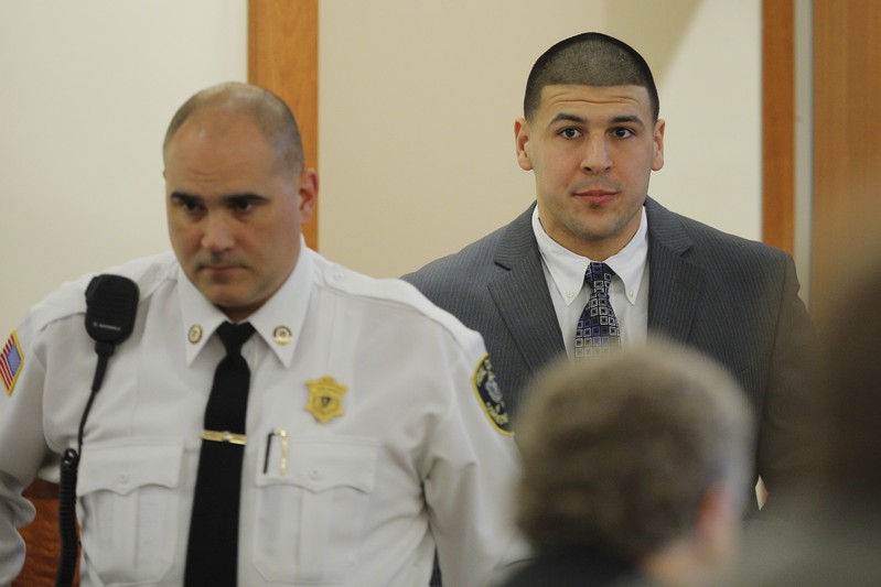 Former New England Patriots football player Aaron Hernandez arrives in the courtroom at Bristol County Superior Court in Fall River