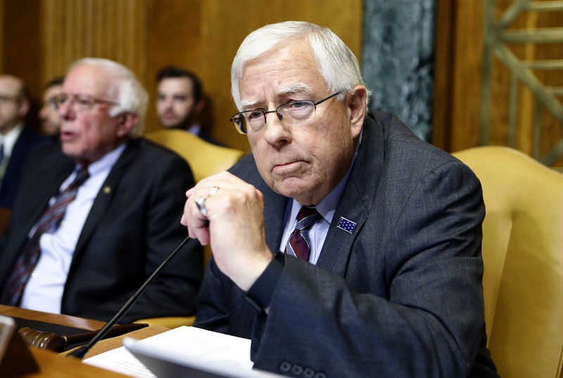 Chairman of the Senate Budget Committee Enzi waits for order to be restored during markup of the FY2018 Budget reconciliation legislation on Capitol Hill in Washington
