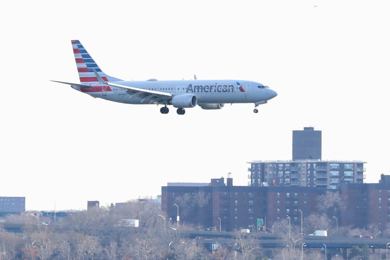 FILE PHOTO: An American Airlines Boeing 737 Max 8, on a flight from Miami to New York City, comes in for landing at LaGuardia Airport in New York