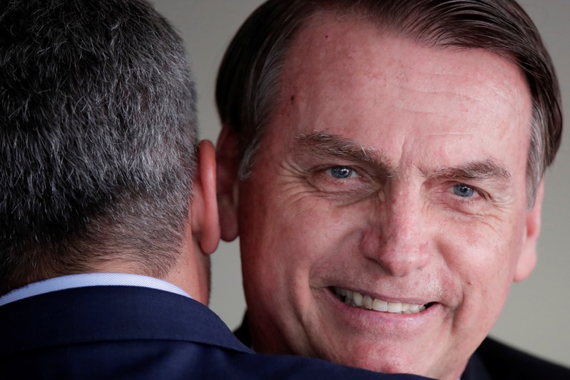 Brazil's President Jair Bolsonaro is greeted by Paraguay's President Mario Abdo after a meeting at the Itamaraty Palace in Brasilia