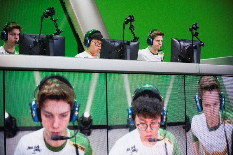 Members of the Los Angeles Valiant team play during the final day of Stage 3 title matches of the Overwatch League at the Blizzard Arena in Burbank