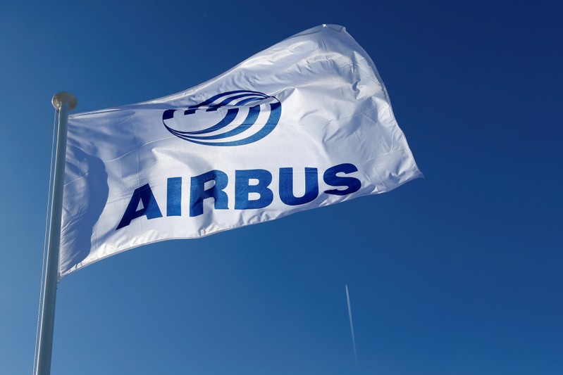 A logo of Airbus is seen on a flag at Airbus headquarters in Blagnac