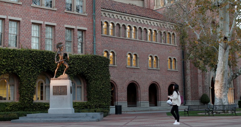 A person walks by the Trojan Shrine at University of Southern California in Los Angeles