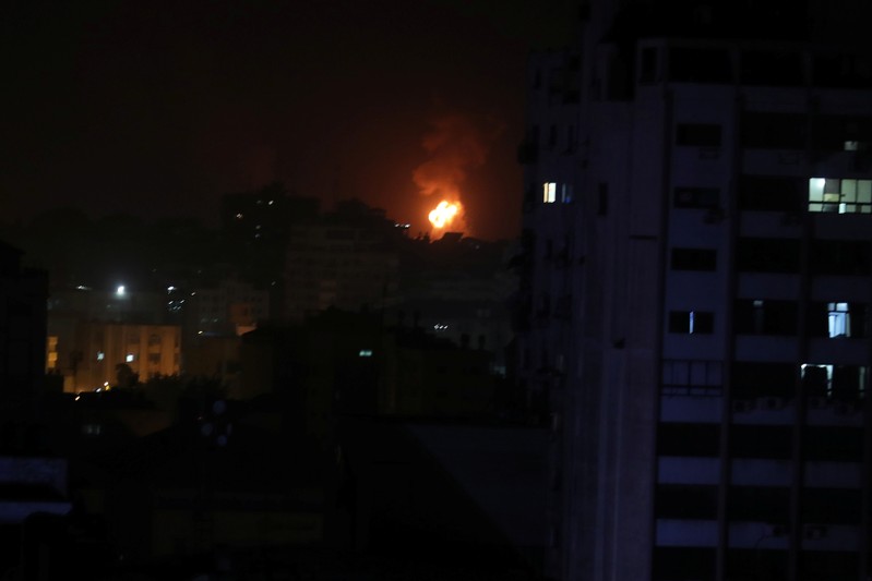 Smoke and flame are seen during an Israeli air strike in Gaza
