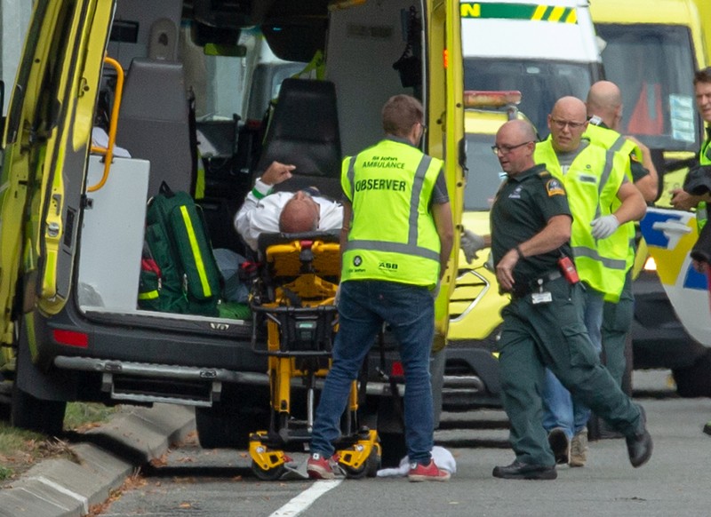 An injured person is loaded onto an ambulance following a shooting at the Al Noor mosque in Christchurch