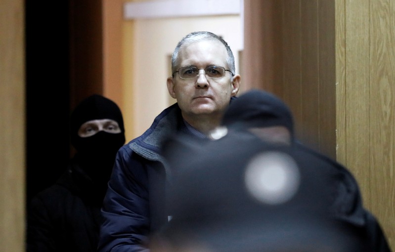 Former U.S. marine Paul Whelan who is being held on suspicion of spying, is escorted out of a courtroom after a ruling regarding extension of his detention, in Moscow