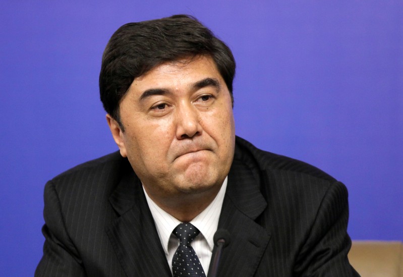 Nur Bekri, Chairman of Xinjiang Uygur Autonomous Region, attends a news conference in Beijing