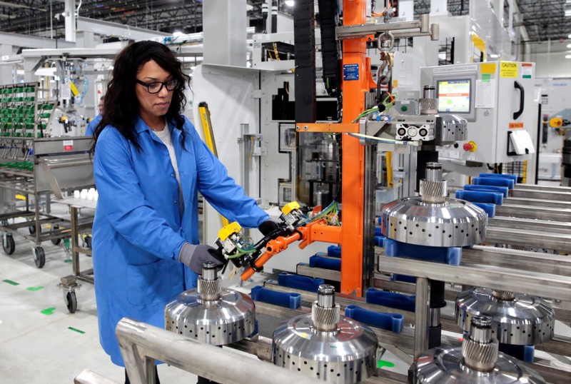 General Motors production worker Dina Mays works on the 10-speed transmission assembly at the General Motors (GM) Powertrain Transmission plant in Toledo, Ohio