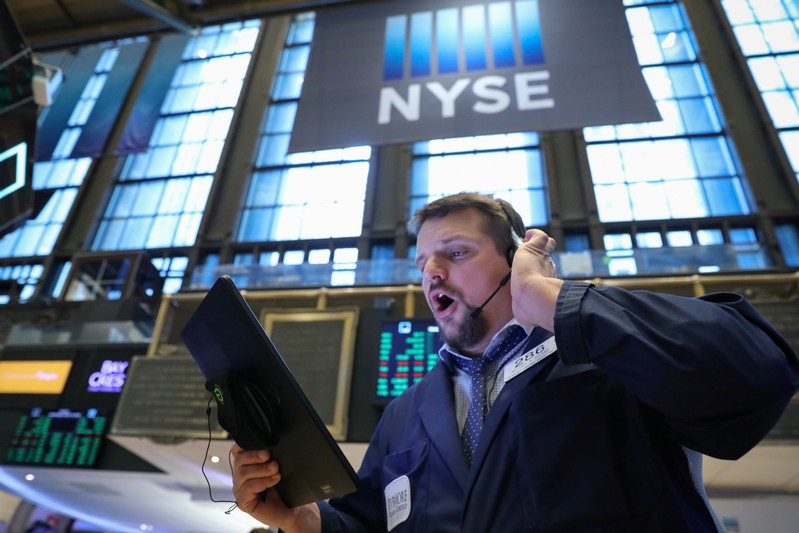 A trader works on the floor at the NYSE in New York
