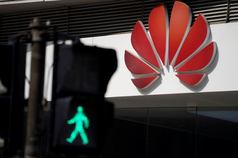 A Huawei company logo is seen outside a shopping mall in Shanghai