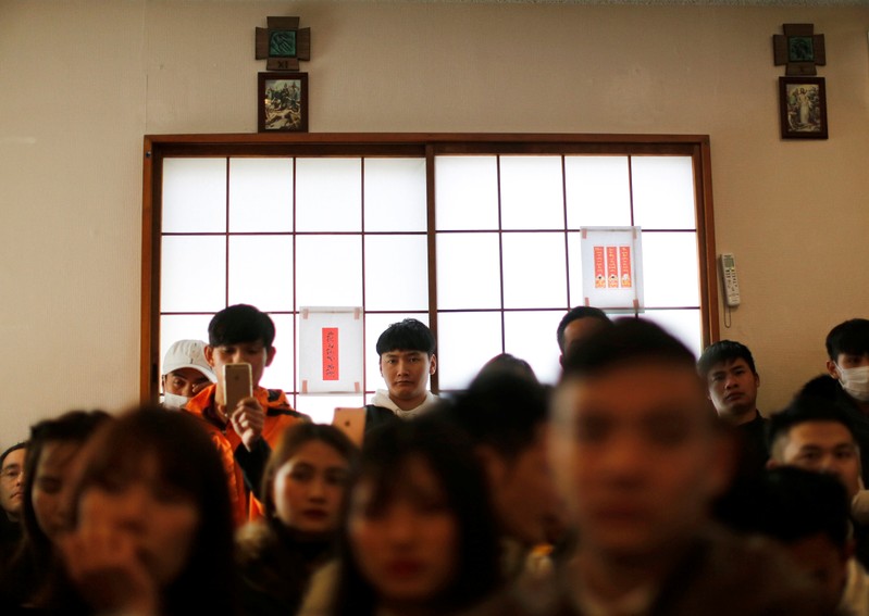 Vietnamese who live in Japan celebrate Vietnamese New Year at a Catholic Church in Kawaguchi, near Tokyo