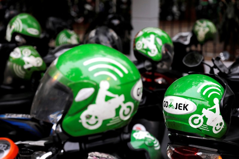 FILE PHOTO: Go-Jek driver helmets are seen during the Go-Food festival in Jakarta