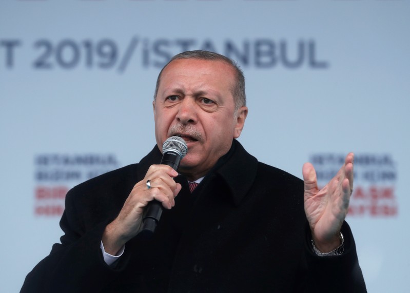 Turkish President Erdogan addresses his supporters during a rally for the upcoming local elections, in Istanbul,