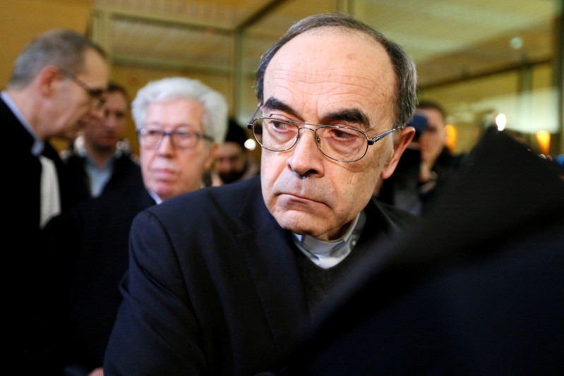 FILE PHOTO: Cardinal Philippe Barbarin, Archbishop of Lyon, arrives to attend his trial at the courthouse in Lyon