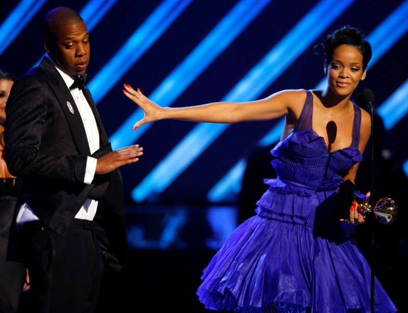 FILE PHOTO: Rihanna and Jay-Z react on stage after winning Grammy for best rap/sung collaboration for