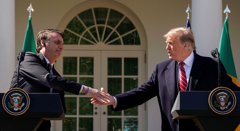 U.S. President Donald Trump and Brazil's President Jair Bolsonaro hold a joint news conference at the White House in Washington