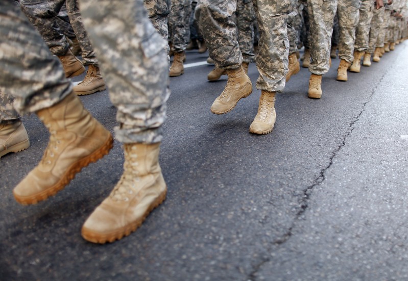 FILE PHOTO - Members of the Army march up 5th Avenue during the Veterans Day Parade in New York