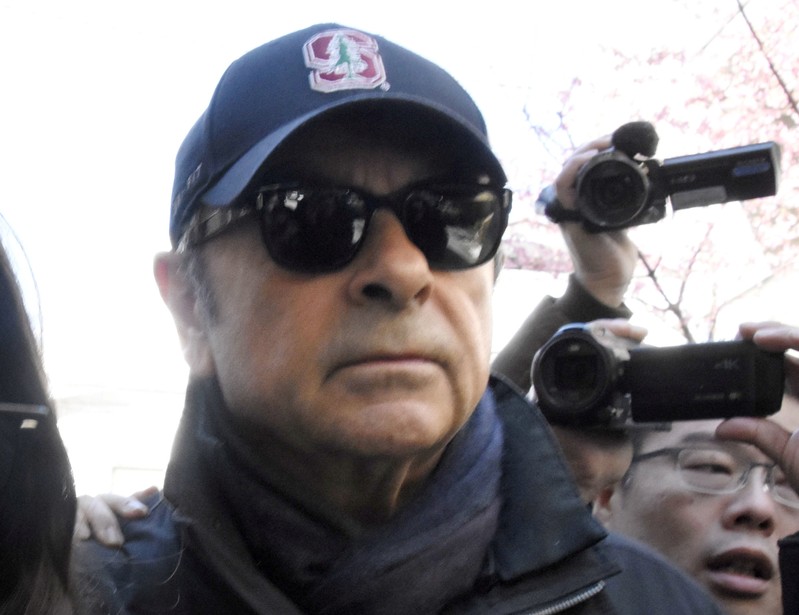 FILE PHOTO: Former Nissan Motor Chairman Carlos Ghosn leaves from his residence in Tokyo