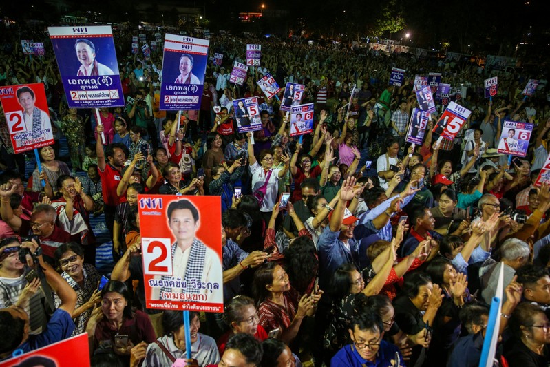 Supporters of Pheu Thai Party attend an election campaign in Ubon Ratchathani Province