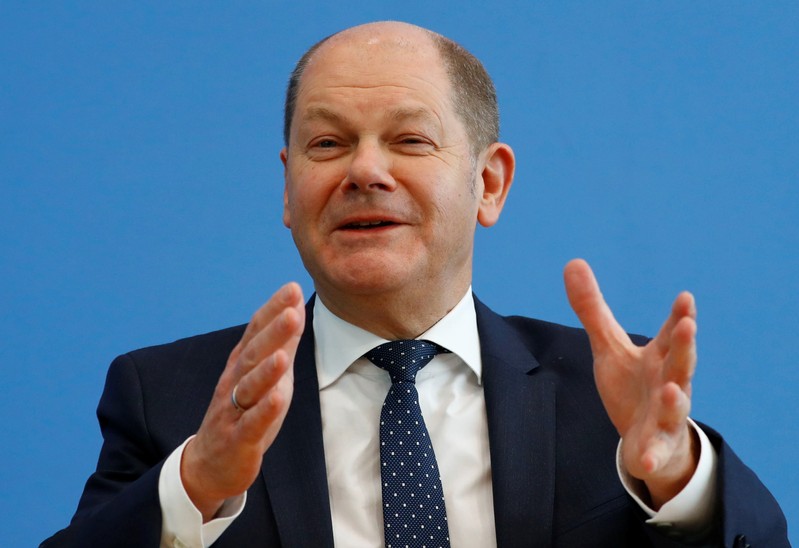 Finance Minister Olaf Scholz addresses a news conference to present the budget plans for 2019 and the upcoming years in Berlin