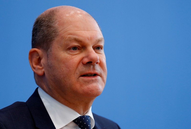 Finance Minister Olaf Scholz addresses a news conference to present the budget plans for 2019 and the upcoming years in Berlin