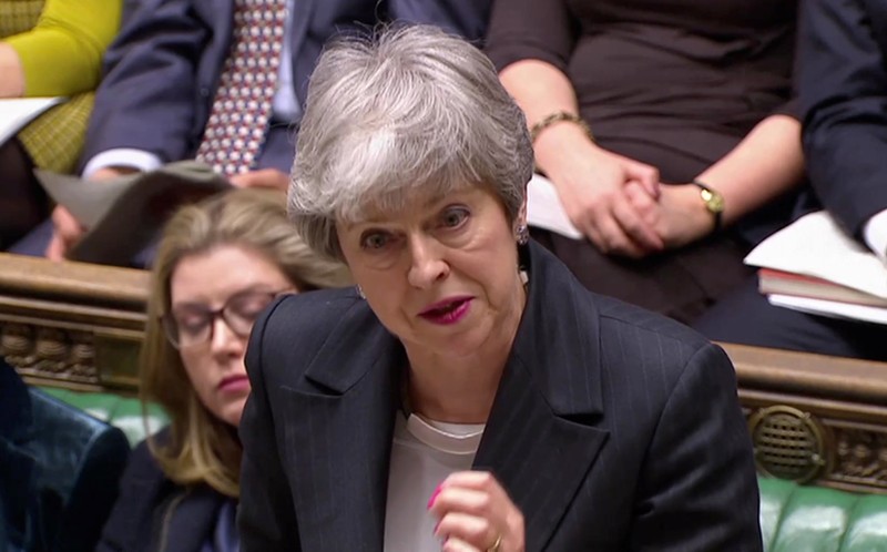 Britain's Prime Minister Theresa May answers questions in the Parliament in London