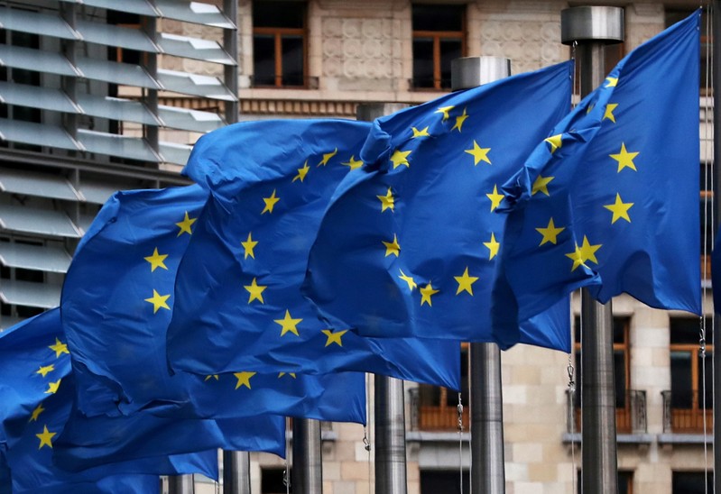 FILE PHOTO: EU flags fly outside the European Commission headquarters in Brussels
