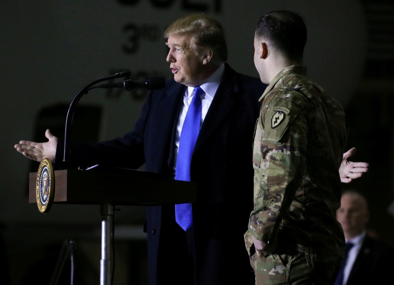 FILE PHOTO: U.S. President Trump addresses members of U.S. military during refueling stop in Anchorage, Alaska