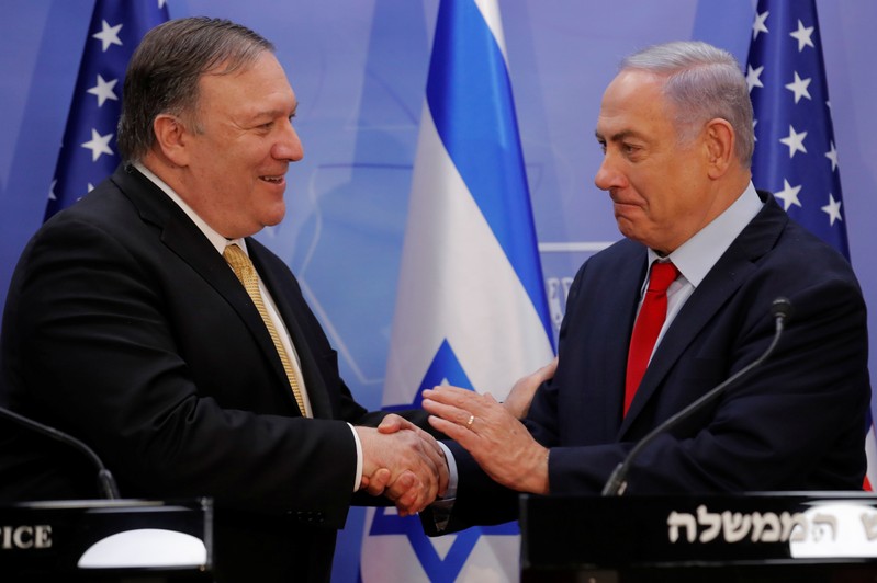 U.S. Secretary of State Mike Pompeo and Israeli Prime Minister Benjamin Netanyahu shake hands as they deliver joint statements during their meeting in Jerusalem
