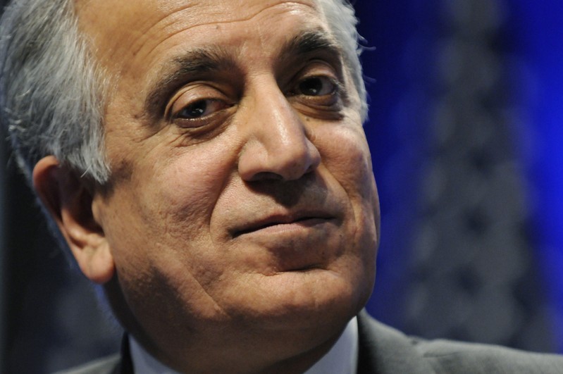 FILE PHOTO - Khalilzad listens to speakers during a panel discussion on Afghanistan at the Conservative Political Action conference (CPAC) in Washington