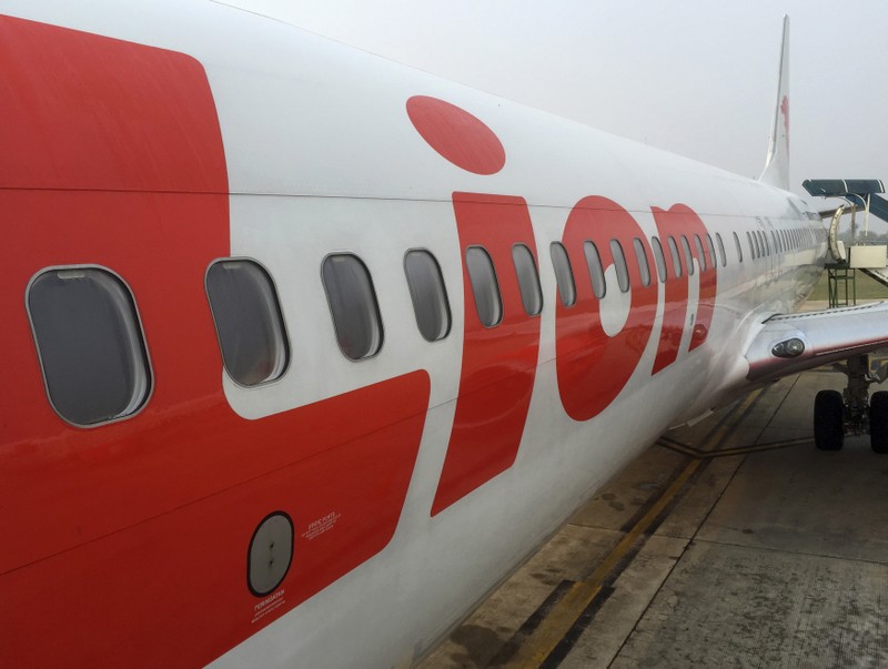 FILE PHOTO: A Lion Air jet sits on the tarmac of Tjilik Riwut Airport in Palangkaraya, central Kalimantan, Indonesia