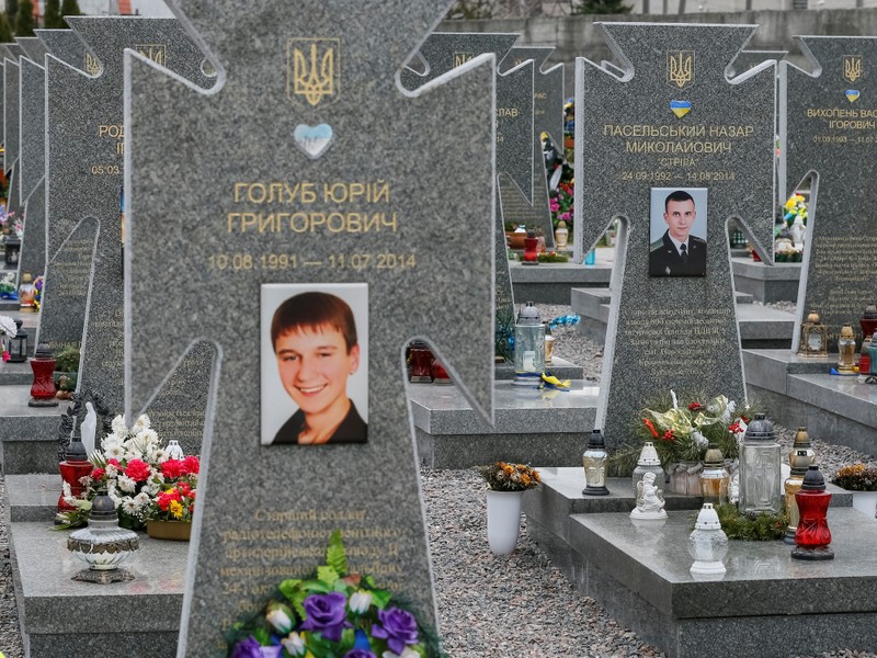 Graves of Ukrainian Army members Holub and Paselsky who were killed in the east, are seen at a 18th century Lychakiv cemetery in Lviv