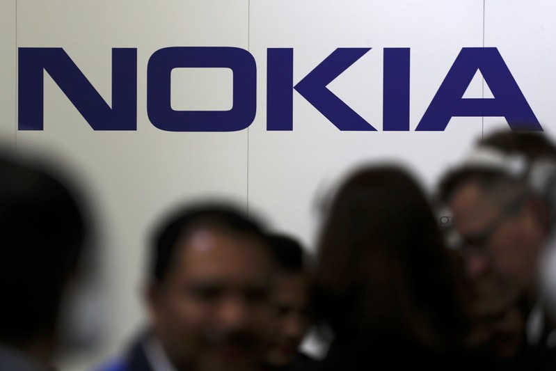 Visitors gather outside the Nokia booth at the Mobile World Congress in Barcelona