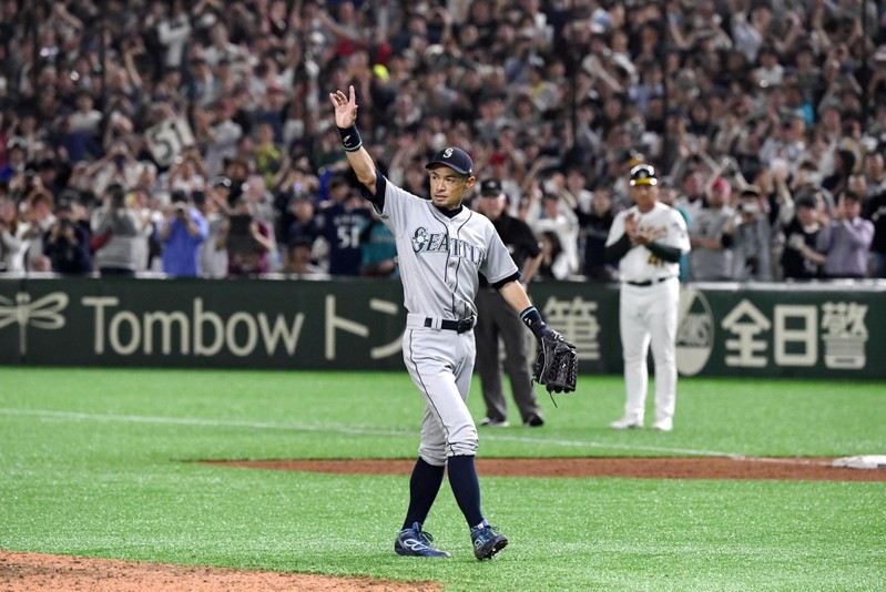 Seattle Mariners right fielder Ichiro Suzuki acknowledges to fans as he leaves the field in the bottom of eighth inning during the game against the Oakland Athletics in Tokyo
