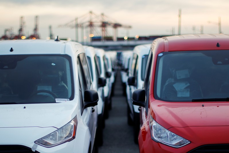 Imported automobiles are parked in a lot at the port of Newark New Jersey