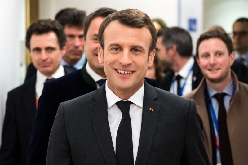 French President Emmanuel Macron prepares to meet German Chancellor Angela Merkel on the sidelines of an EU summit in Brussels