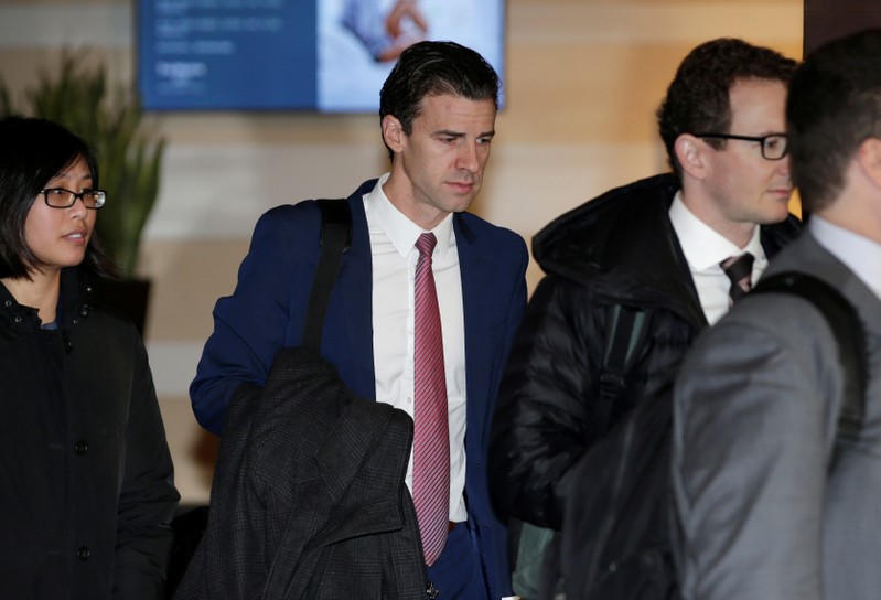 U.S. trade delegation member Clete Willems leaves a hotel for talks with Chinese officials in Beijing