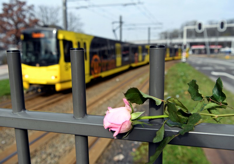 FILE PHOTO: Flowers are placed at the site of a shooting in Utrecht