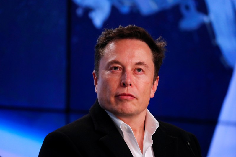 FILE PHOTO: Musk looks on at SpaceX Falcon 9 post-launch news conference in Cape Canaveral