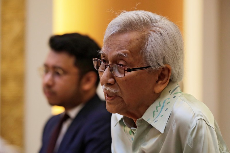 Malaysia's new government advisor Daim Zainuddin speaks during a meeting with Chinese Foreign Minister Wang Yi at the Ministry of Foreign Affairs in Beijing