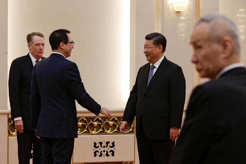 U.S. Treasury Secretary Steven Mnuchin talks with Chinese President Xi Jinping in Beijing