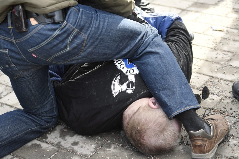 A man is detained after trying to hit Finnish Foreign Minister Timo Soini at the Korson Maalaismarkkinat country fair in Vantaa