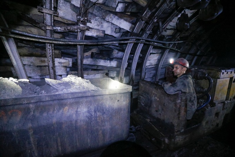 A miner works inside the Novovolynska-9 coal mine in Novovolynsk