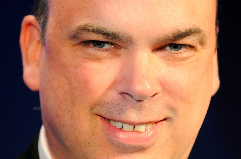 FILE PHOTO: Mike Lynch, Founder and Chairman of Autonomy Corporation, poses for photographers at an awards ceremony in central London