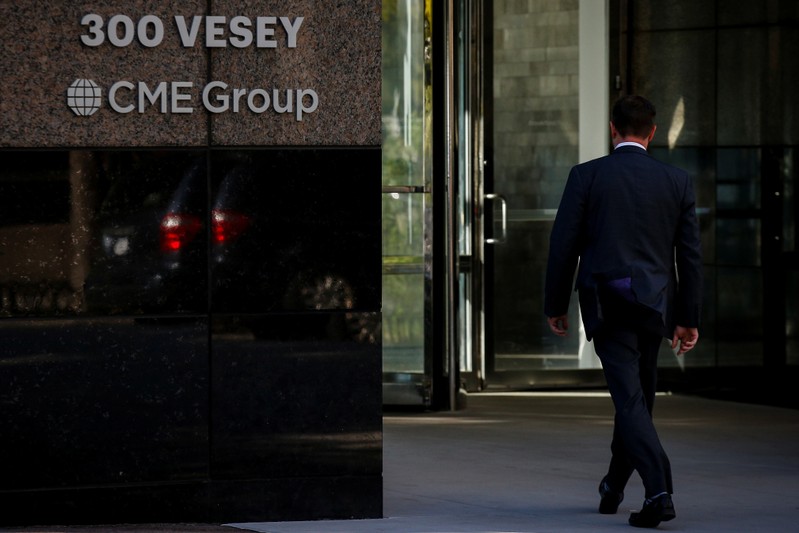 A man enters the CME Group offices in New York