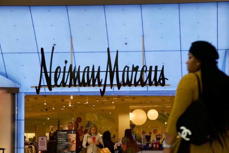 Shoppers enter and exit the Neiman Marcus at the King of Prussia Mall, United States' largest retail shopping space, in King of Prussia